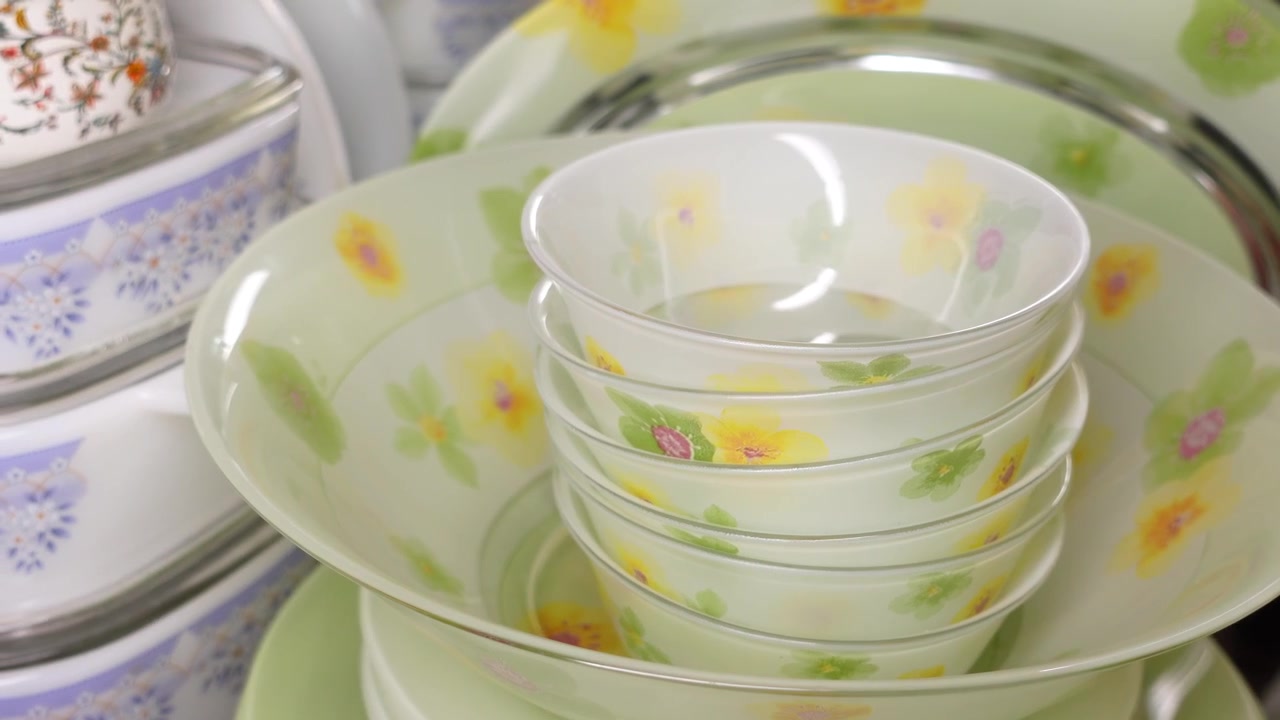 Close-up of Stacked Dinnerware with Floral Patterns