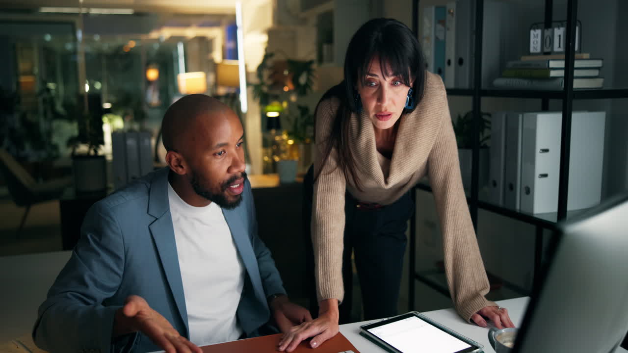 Business professionals collaborating in office