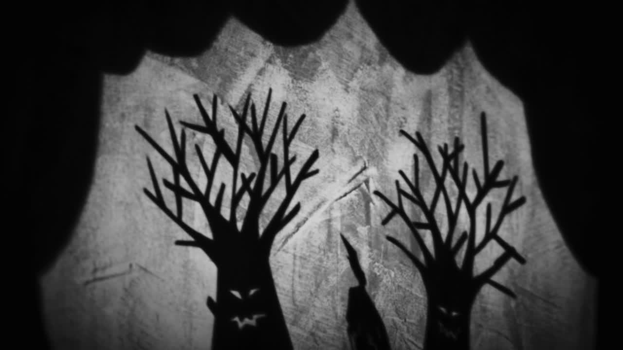 Shadow Puppet Show of a Boy in a Grim Forest