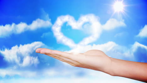 Hand-presenting-heart-cloud-design