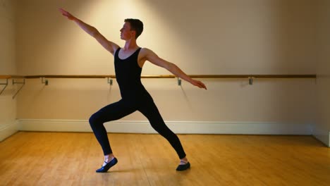 male dancer practicing a ballet dance