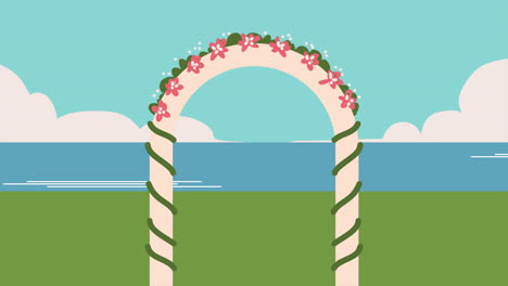 floral archway by the ocean