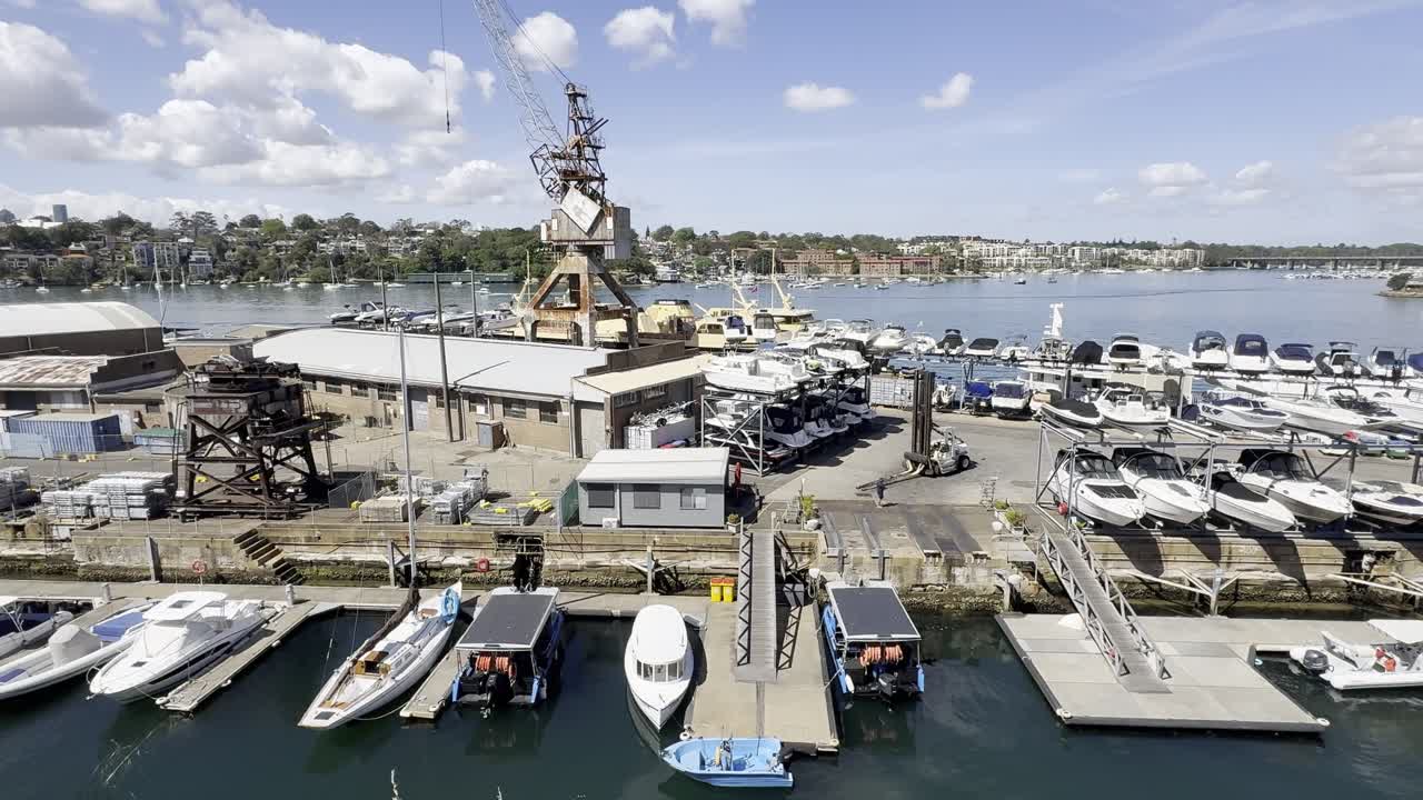 A historical marina with modern boats on the historical industrial Cockatoo Island in Sydney harbour, Australia
