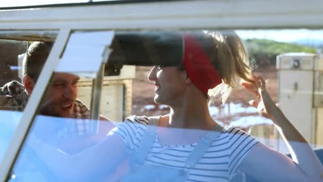 couple interacting with each other near a car 4k