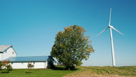 wind turbine by a farmhouse