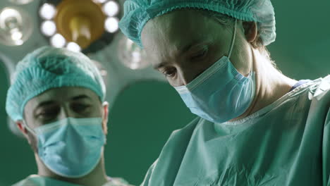 medical team performing surgery in operating room