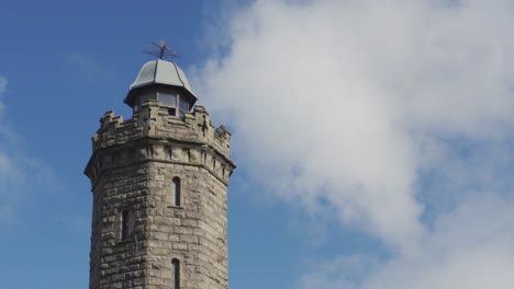 a view of darwen tower in lancashire on a windy day