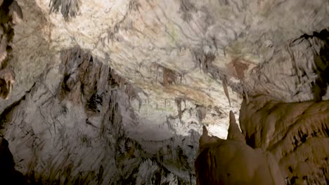 postojna caves interior pan over stalagmites stalactites