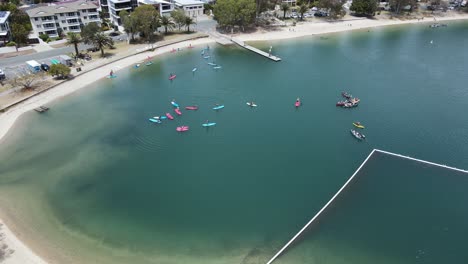 urban city watersports activity area close to a coastal neighbourhood and popular holiday park