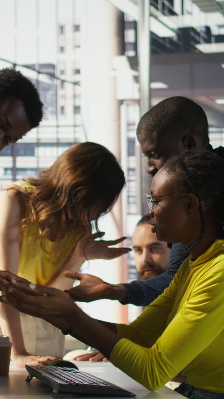 Vertical video Upset IT workers in office debating, doing brainstorming
