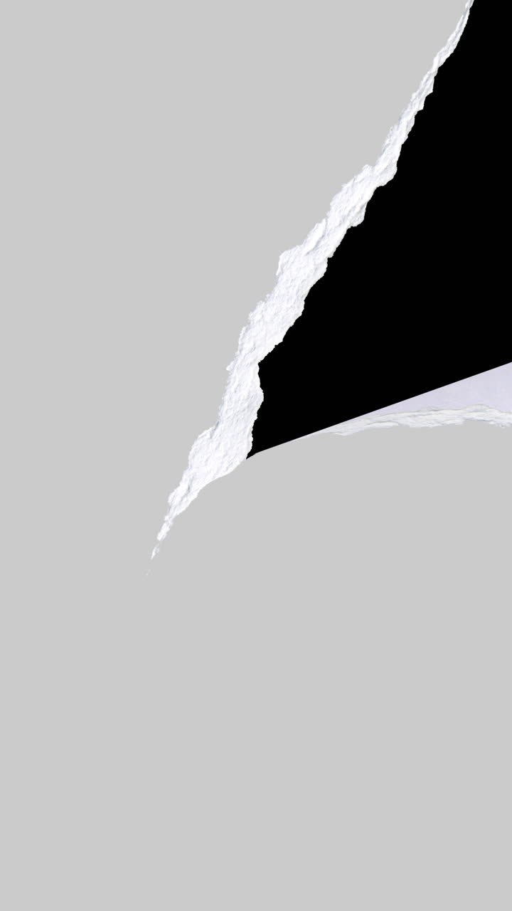 Torn White Paper Revealing Black Background Transition
