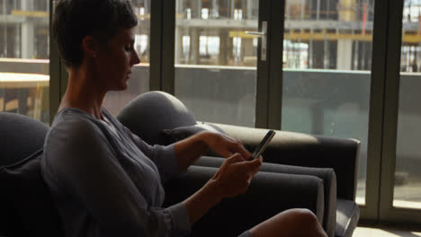 female executive using mobile phone 4k