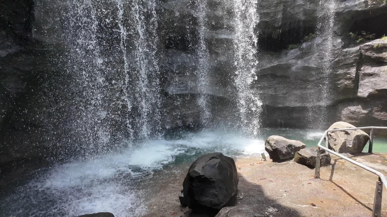 Waterfall Scene with Rocks and Water