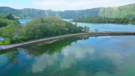 Sete-cidades,-azores-with-a-stunning-lake-surrounded-by-lush-green-hills,-aerial-view