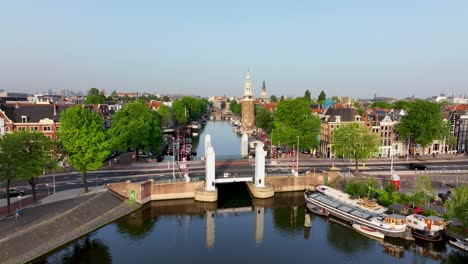 aerial view of montelbaanstoren tower and canal in amsterdam