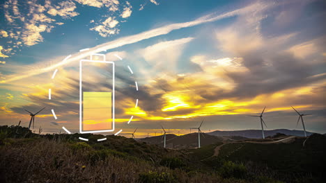 charging battery icon with wind turbines in the background - wind energy concept