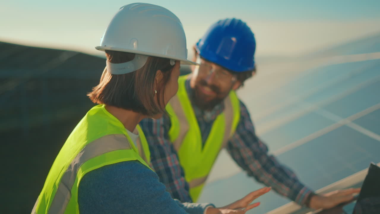 Engineers Inspecting Solar Panels