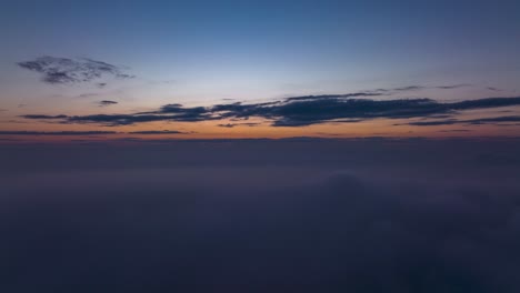 stunning aerial sunset above the clouds