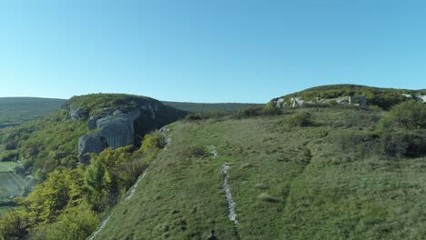 aerial view of mountains and valley with person