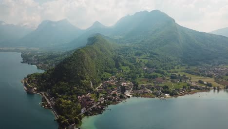 Lake-Annecy-summer-landscape-in-French-Alps-mountainside,-aerial-view