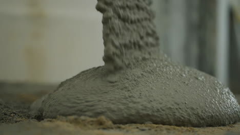 wet concrete being poured