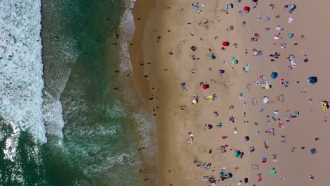 over-head-looking-down-shot-with-a-drone-of-beach-goers-in-manhattan