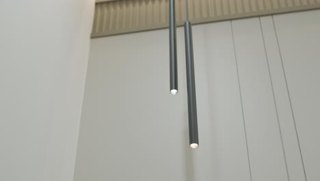 modern minimalist hanging lights with sleek design. elegant ceiling lights add sophistication to interior decor, providing stylish illumination in a contemporary setting