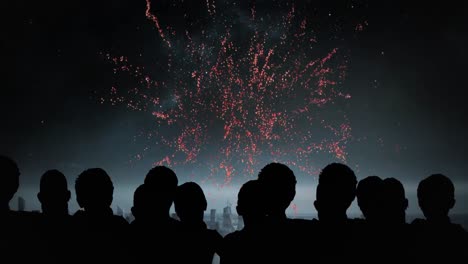 animation of silhouettes of people and cityscape over fireworks