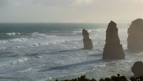 waves crashing against iconic limestone stacks