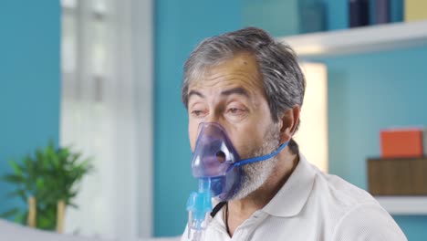 man wearing respirator relaxes. lung disease.