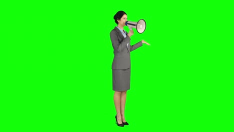 Pretty-businesswoman-shouting-with-megaphone