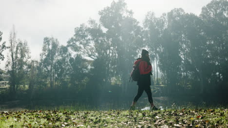 hiking, morning and woman in nature with mist