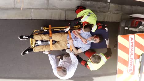 paramedic using an external defibrillator during cardiopulmonary resuscitation