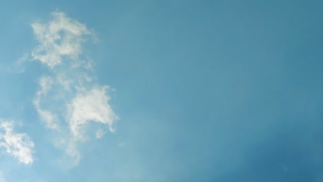 beautiful timelapse of clouds moving in the blue sky