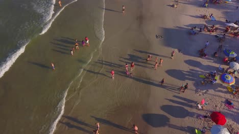 Aerial-tilt-reveal-shot-of-Bombas-y-Bombinhas-at-golden-hour-in-Brazil