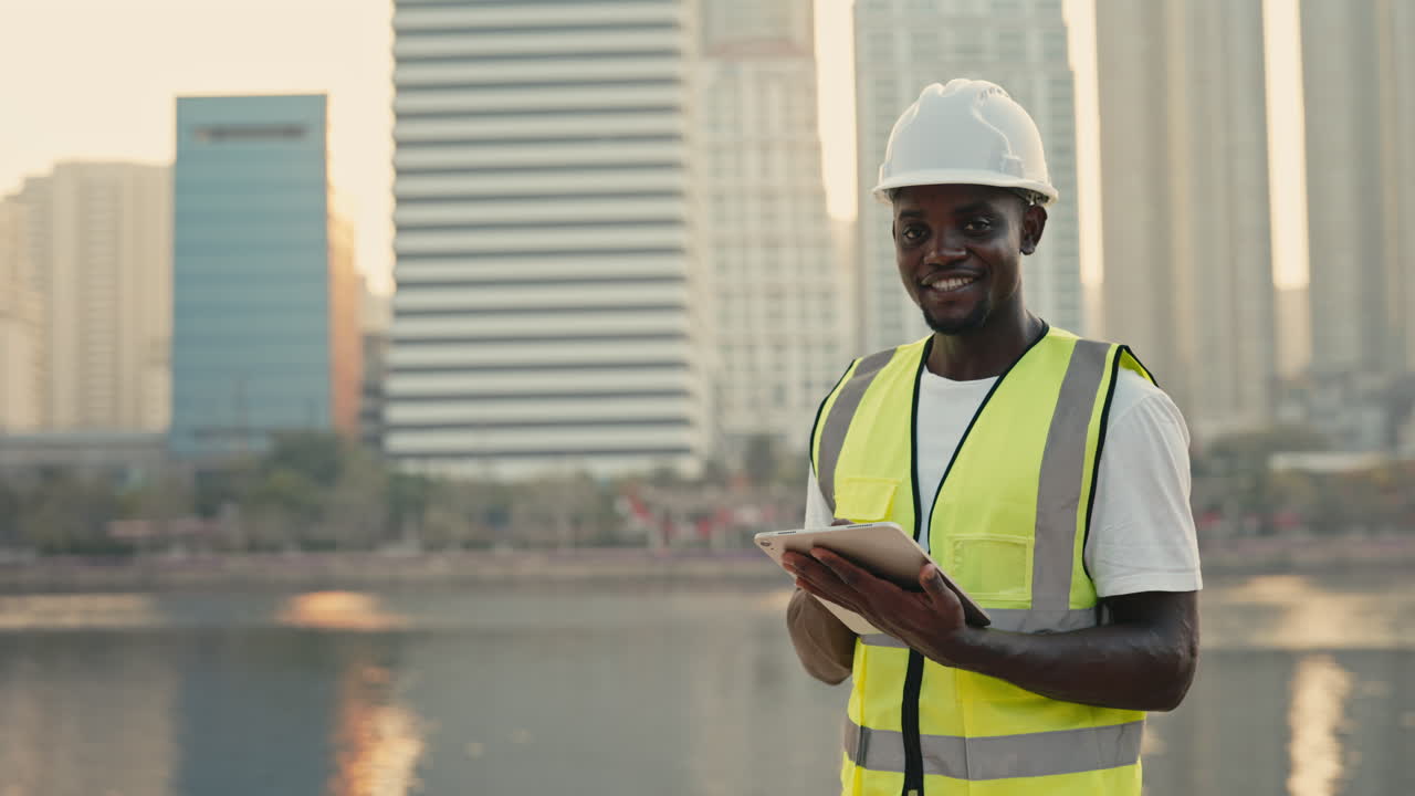 Construction worker using tablet in the city