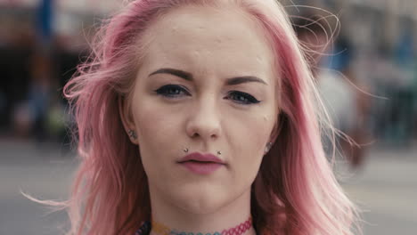 slow motion portrait of caucasian girl with pink hair