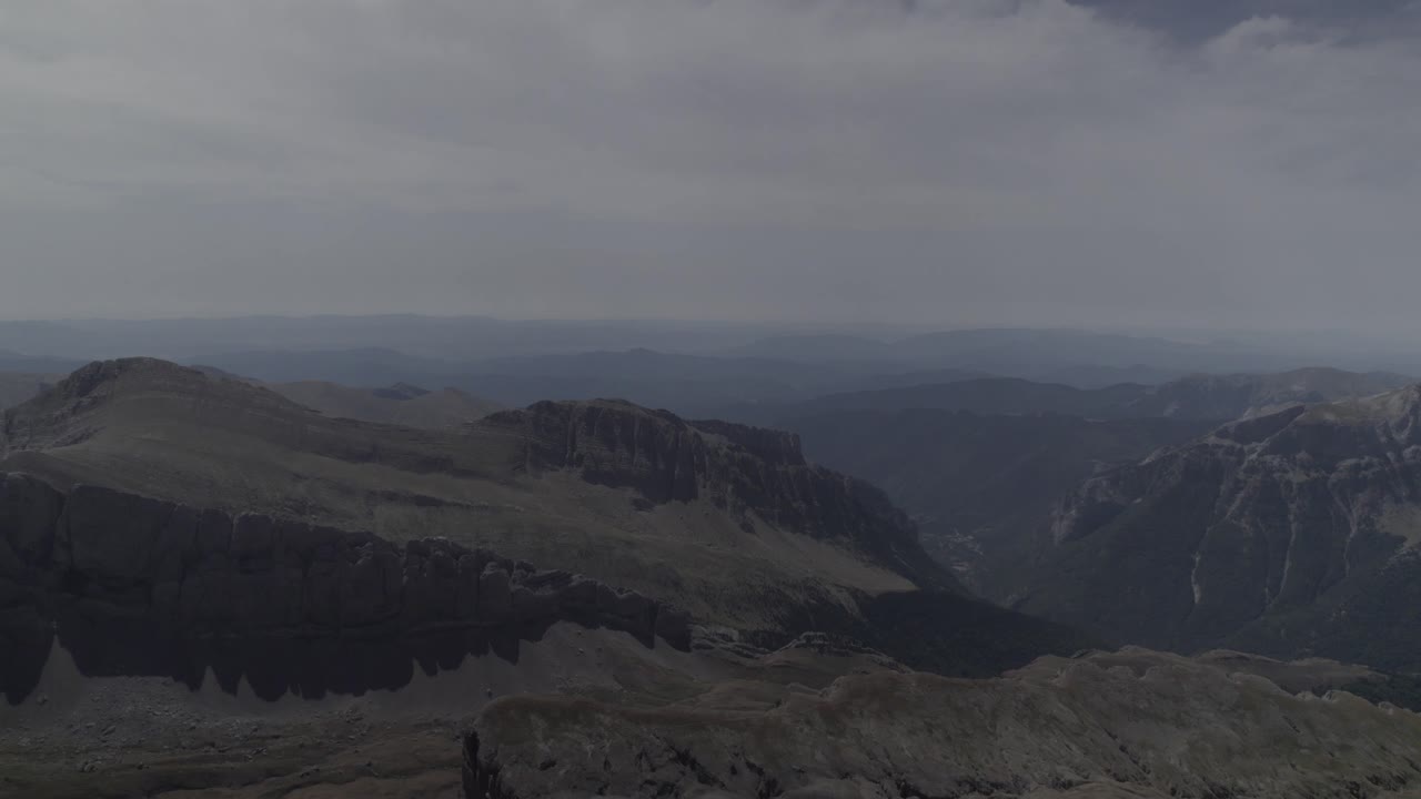 This drone video features a stunning frontal descriptive shot flying over the majestic mountains of Pico del Castillo d’Acher in the Aragonese Pyrenees, Spain, showcasing breathtaking natural beauty.