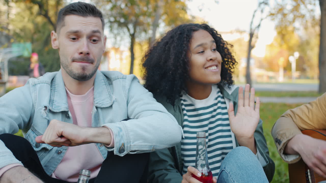 Friends Enjoying Music in Park