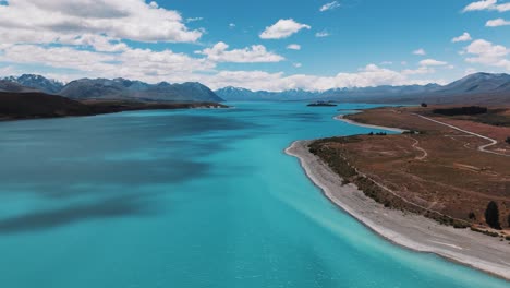 stunning turquoise glacier lake tekapo with alps of new zealand in background