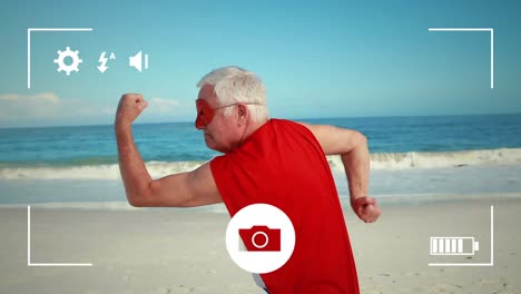 Tomando-Fotografías-De-Un-Hombre-En-Una-Playa-Con-Una-Cámara-Digital