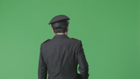 pilot in uniform on green screen