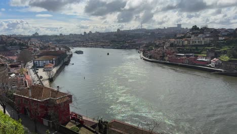 porto city with douro river and buildings on banks