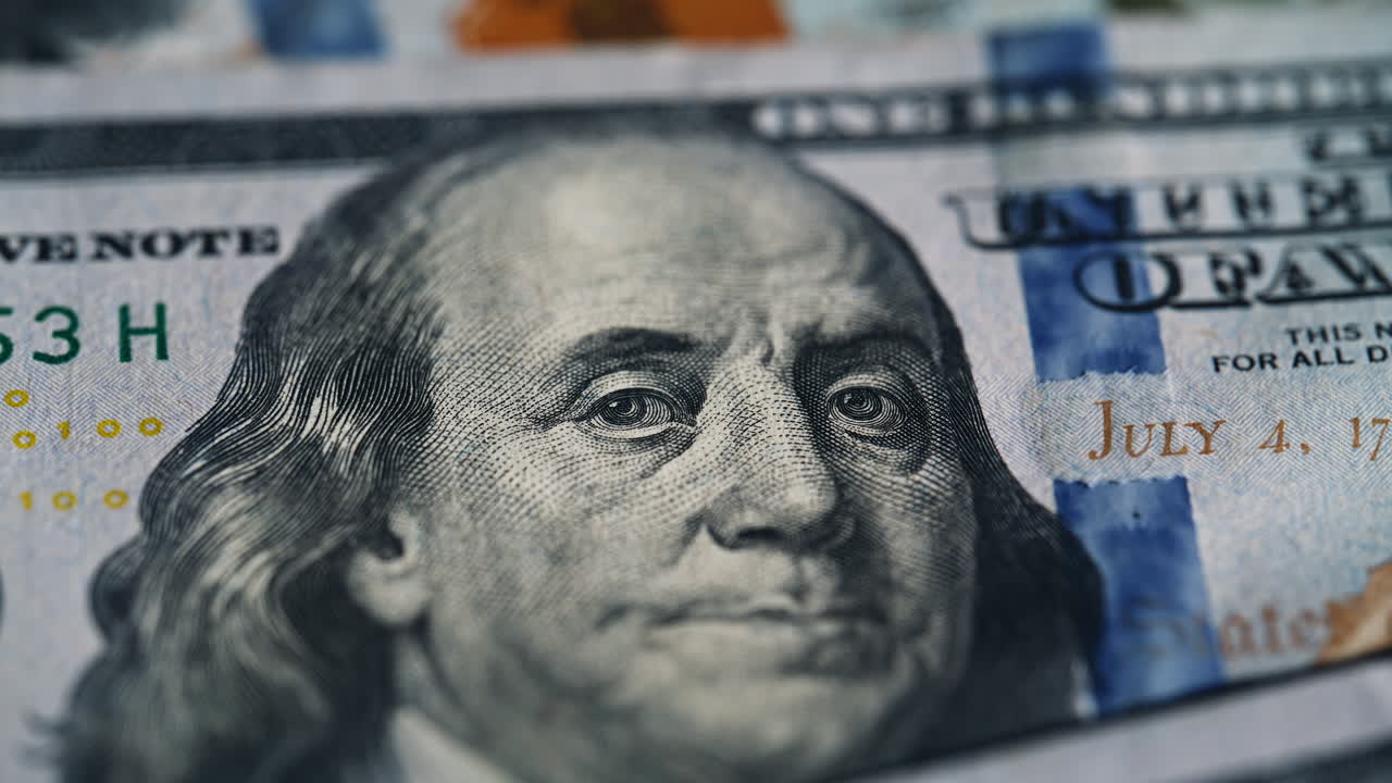 Hundreds dollar banknotes scattered table closeup. Paper bills currency