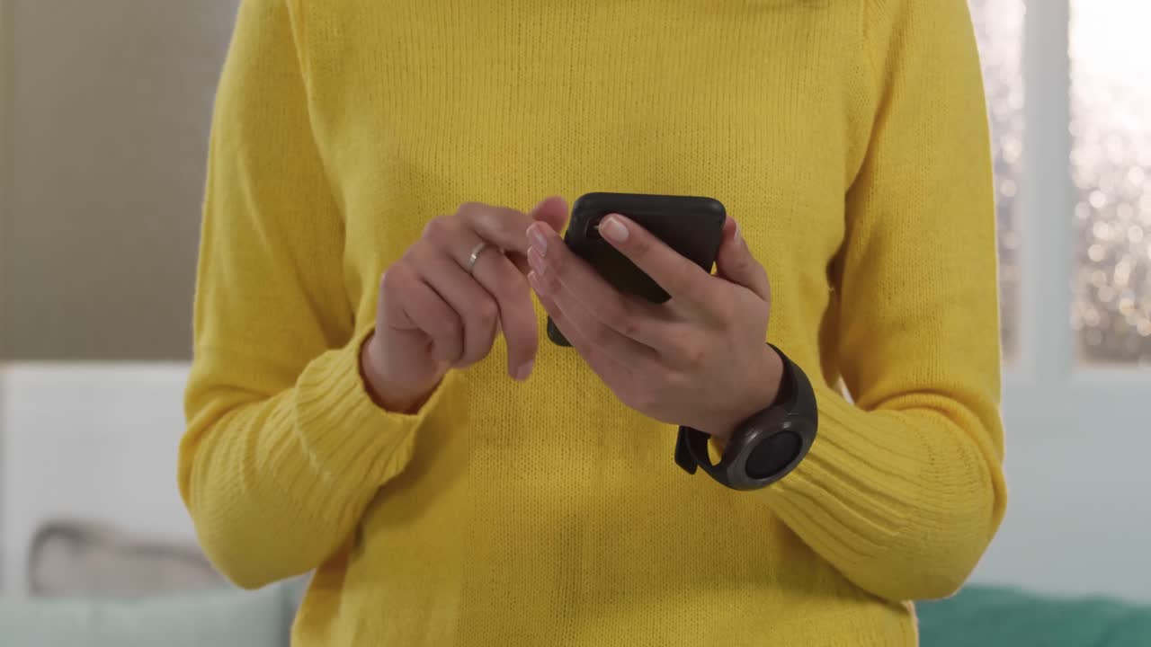 Caucasian woman using her phone