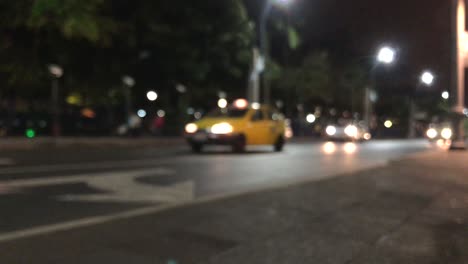 Blurred-scene-of-cars-passing-by-in-a-low-traffic-street-in-Guayaquil,-Ecuador-3