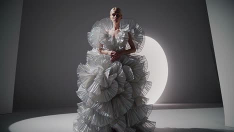 woman in a stunning white ruffled dress