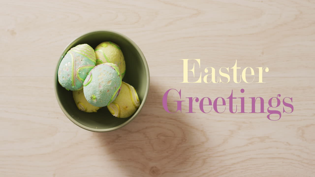 Animation of easter eggs and easter greetings text