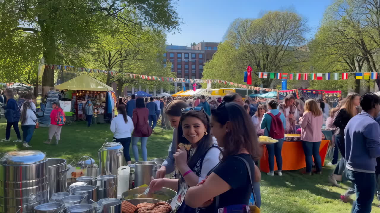 Vibrant Outdoor Cultural Festival with International Flags and Diverse Crowd