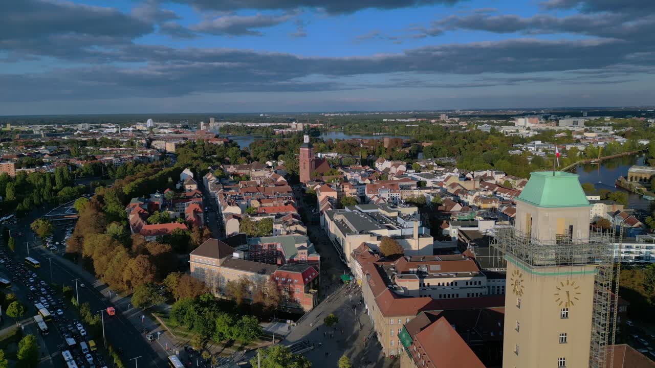 Berlin Spandau old town with its red rooftops, churches, and surrounding greenery. Amazing aerial view flight drone shot from above